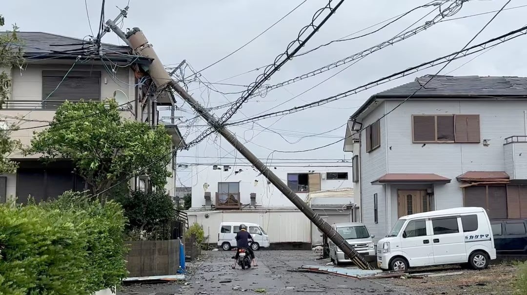 a person rides through a fallen pole following typhoon shanshan in miyazaki japan on august 29 2024 in this screengrab taken from a social media video photo reuters