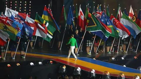 Getty Images The flags of the commonwealth displayed at the Glasgow 2014 closing ceremony