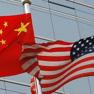 China hits 9 US firms with property freeze