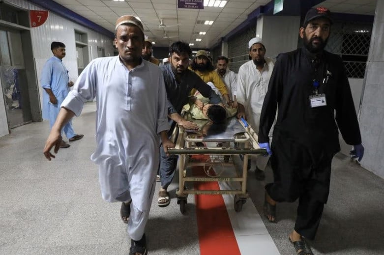 people transport a man who was injured after a blast in bajaur district of khyber pakhtunkhwa at the lady reading hospital in peshawar pakistan july 30 2023 photo reuters file