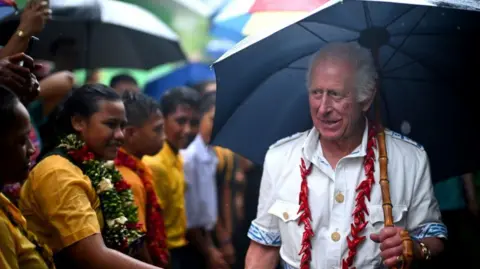 PA Media King Charles III during a visit to O Le Pupu'Pue National Park, Sa'agafou on the island of Upolu, to meet local villagers and community groups involved in the reforestation efforts on day five of the royal visit to Australia and Samoa.