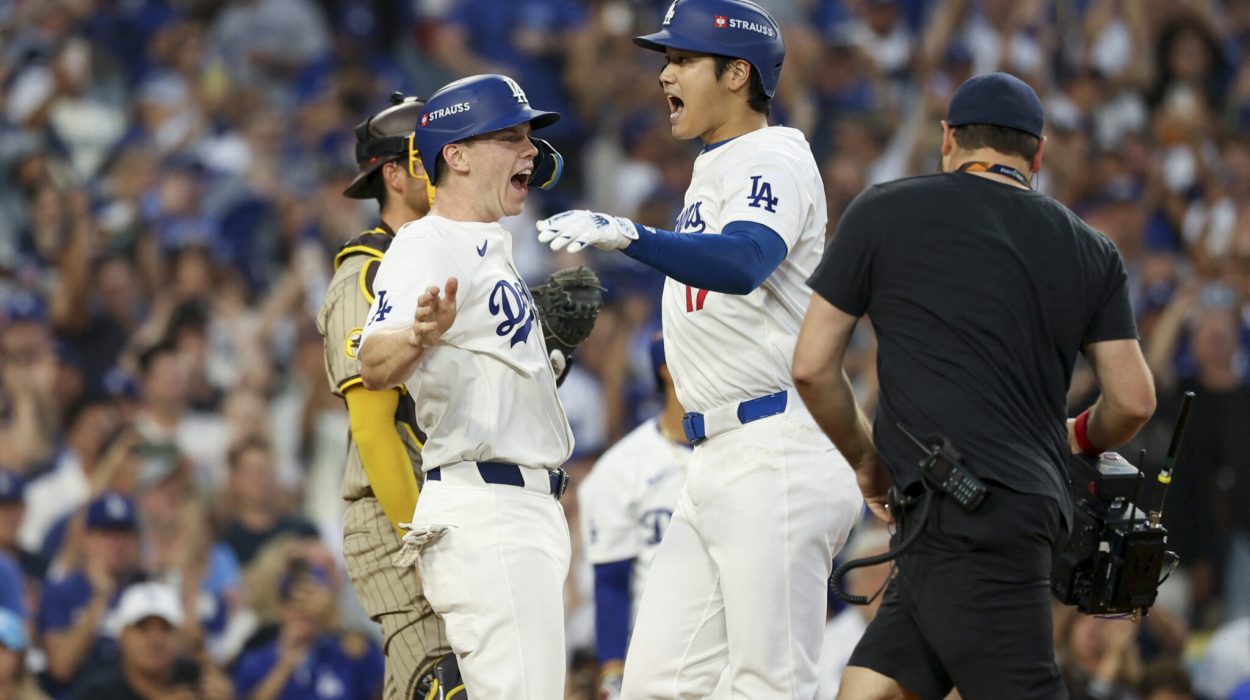 Ohtani stuns in playoff debut with 3-run bomb