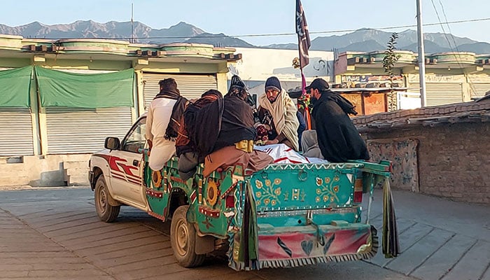 Relatives transport a dead body of a victim who was killed in clashes in Kurram district in Parachinar, Khyber Pakhtunkhwa province, on November 22, 2024. — AFP