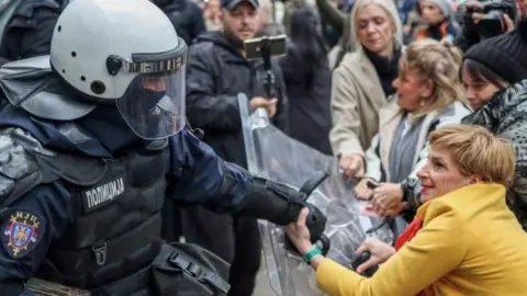 Reuters Scuffles break out during a demonstration in Novi Sad in Serbia over the deaths of 15 people in a station collapse