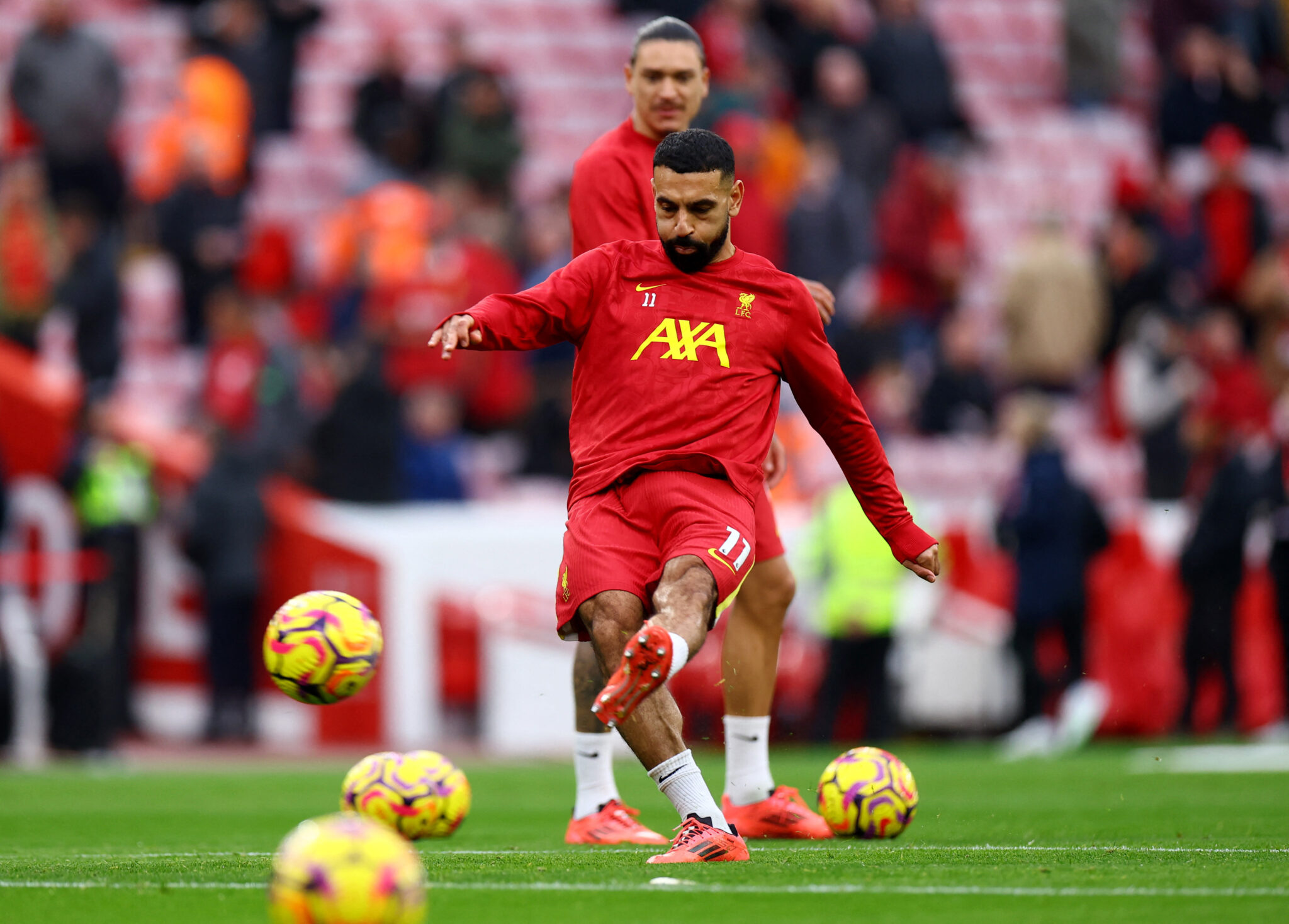 Super Salah sends Liverpool top with victory over Brighton