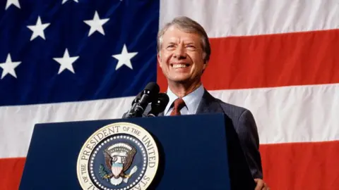 Getty Images President Jimmy Carter addressing a town meeting in 1979