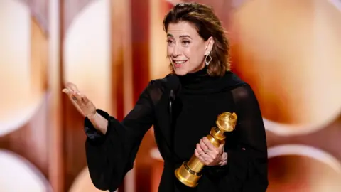 Getty Images Fernanda Torres accepts the award for Female Actor - Motion Picture - Drama at the 82nd Annual Golden Globe Awards at The Beverly Hilton on January 05, 2025 in Beverly Hills, California