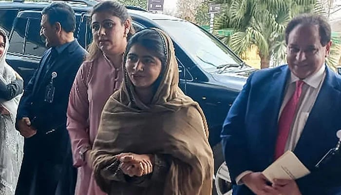 Nobel Peace Prize Laureate Malala Yousafzai (centre) arrives in Islamabad on January 11, 2025. — AFP