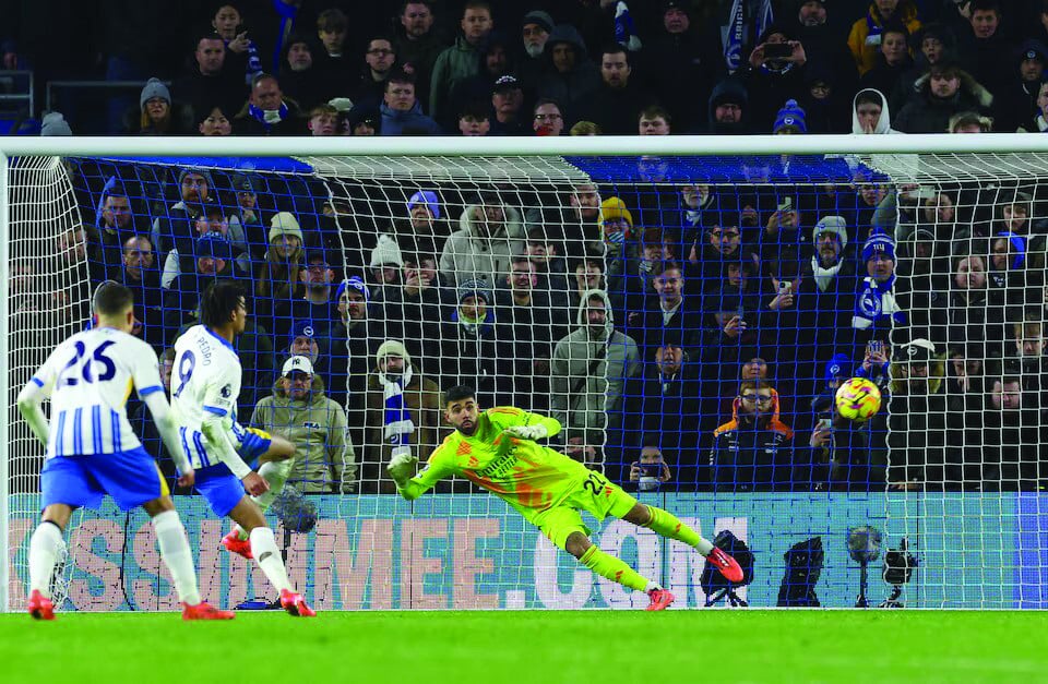 brighton hove albion s joao pedro scores their first goal past arsenal s david raya during the premier league match at the american express community stadium brighton on january 4 photo reuters