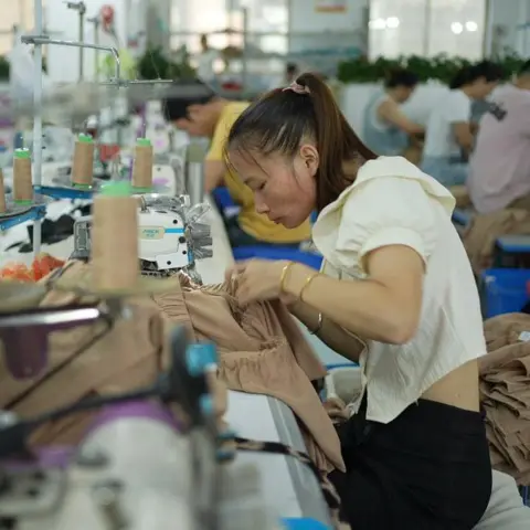 Xiqing Wang/BBC The BBC spoke with factory workers in Guangzhou's Panyu neighbourhood, the so-called "Shein village"