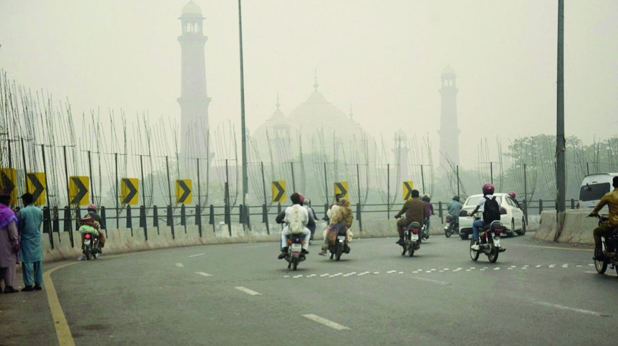 a thick layer of smog dampens the beauty of the iconic badshahi mosque in lahore photo nni