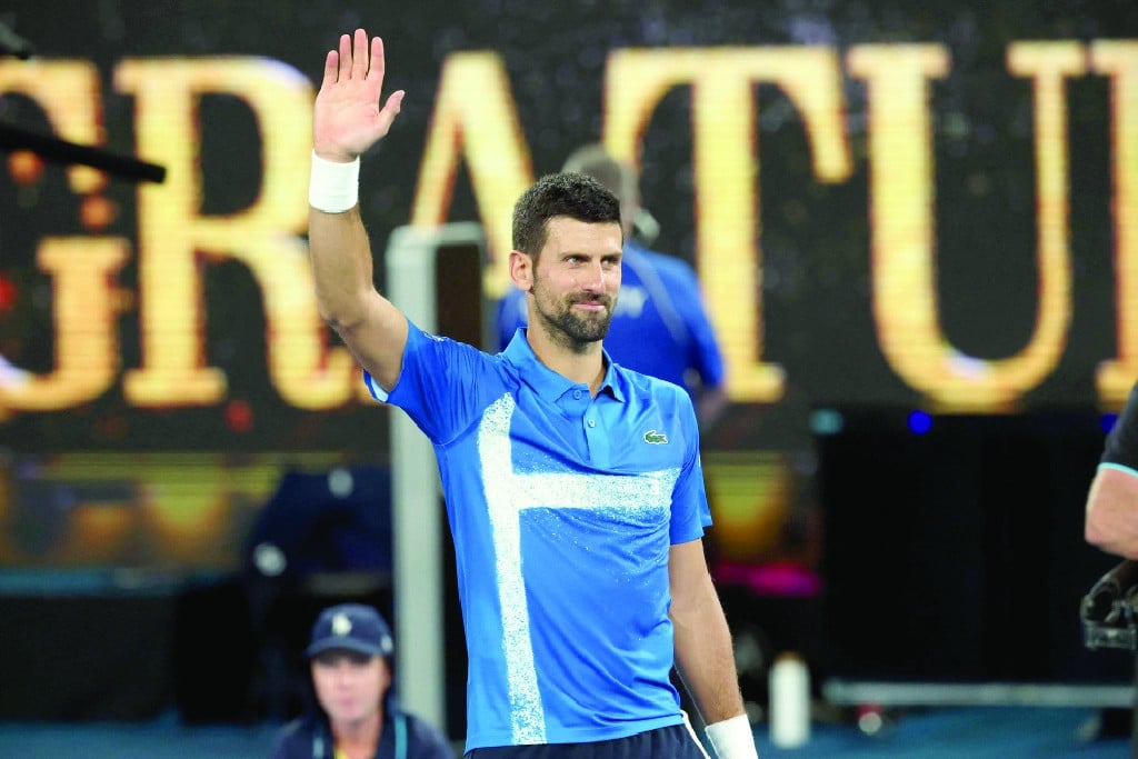 novak djokovic celebrates after defeating jaime faria in the second round of the australian open photo afp