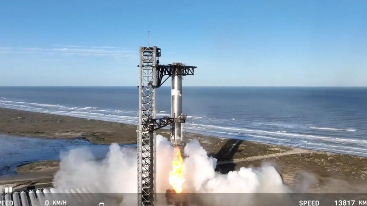 in this screen grab taken from the spacex broadcast the starship s super heavy booster is grappled mid air as it returns to the launch pad at starbase near boca chica texas on january 16 2025 photo afp