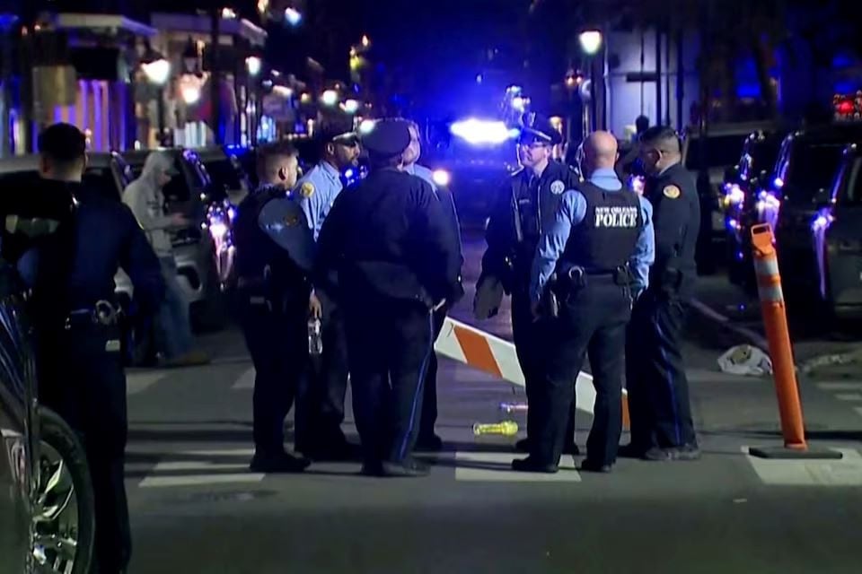 police officers stand at the scene where a truck drove into a large crowd on bourbon street in the french quarter of new orleans louisiana us january 1 2025 in this screengrab taken from a video photo reuters