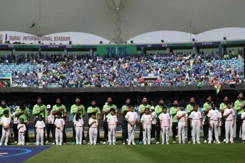 Getty Images  Pakistan sing the national anthem during the ICC Champions Trophy 2025 match between Pakistan and India at Dubai International Cricket Stadium on February 23, 2025 in Dubai, United Arab Emirates.