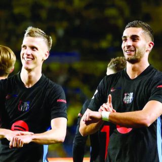 fc barcelona s ferran torres celebrates scoring their second goal with dani olmo during their la liga match with las palmas at estadio gran canaria las palmas on february 22 photo reuters