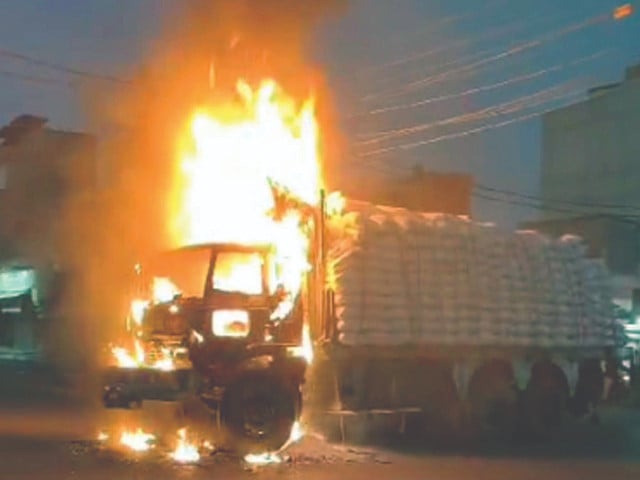 people protesting against fatal accidents caused by heavy vehicles set a truck on fire in the korangi area photo ppi