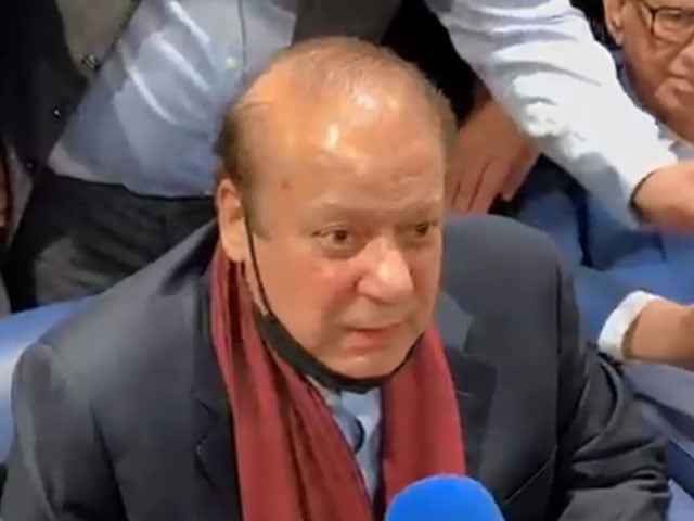 pml n supremo nawaz sharif talks to reporters at dubai airport shortly before boarding a flight to return to pakistan photo express