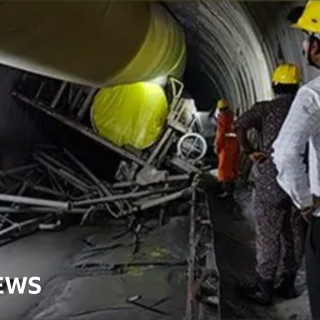 Race to save eight Indian workers trapped inside tunnel