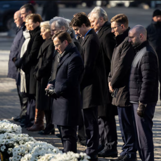 ukraine s president volodymyr zelenskiy with his wife olena european commission president ursula von der leyen european council president antonio costa canada s prime minister justin trudeau spanish prime minister pedro sanchez latvia s president edgars rinkevics president of lithuania gitanas nauseda estonian prime minister kristen michal denmark s prime minister mette frederiksen icelandic prime minister kristrun frostadottir norwegian prime minister jonas gahr stoere finnish president alexander stubb sweden s prime minister ulf kristersson visit a makeshift memorial place displaying ukrainian flags with the names of fallen service members at the independence square amid russia s attack on ukraine in kyiv ukraine february 24 2025 photo ukrainian presidential press service reuters