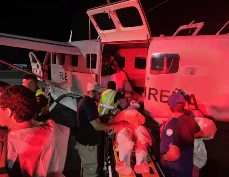 rescue teams work on rescuing victims of a plane crash near the international airport of roatan in roatan island in this pictured obtained in march 17 2025 photo armed forces of honduras reuters