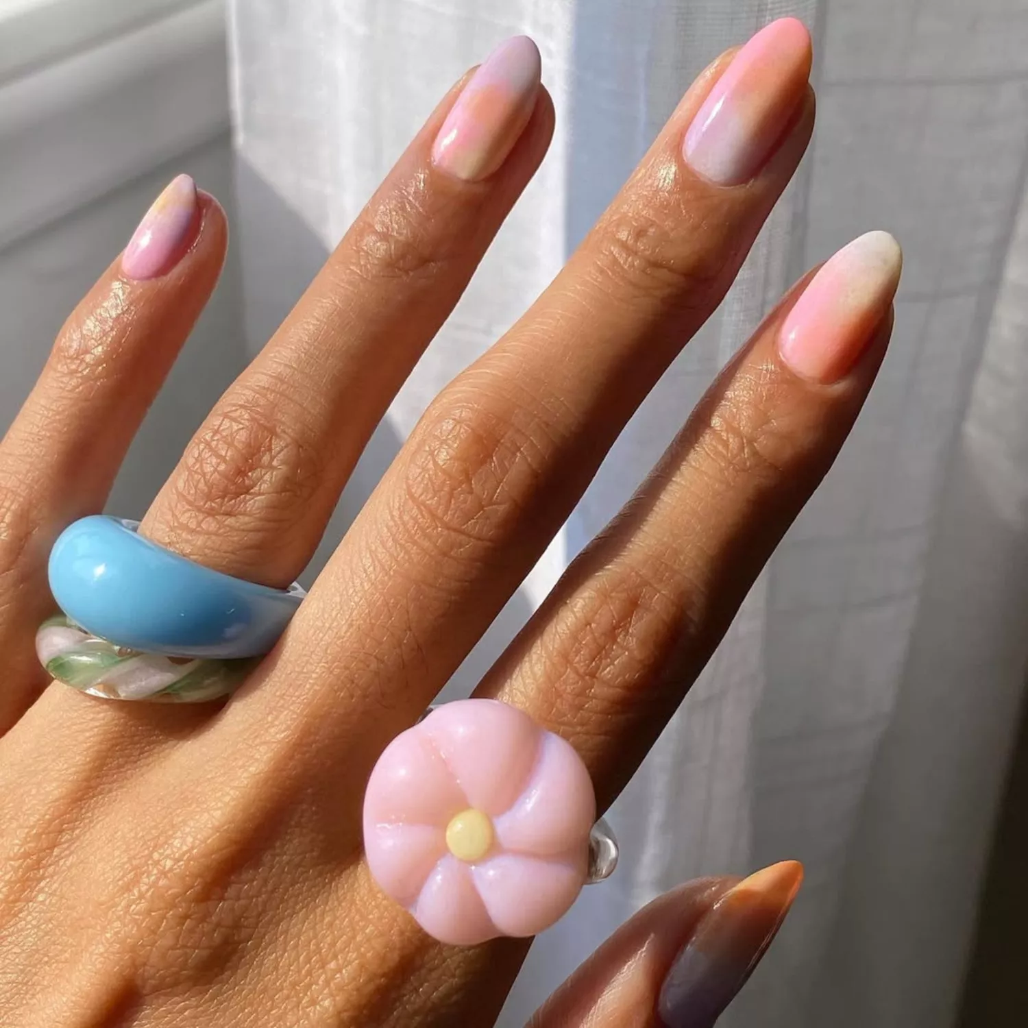 Medium-length nails with sorbet-colored ombre nail art