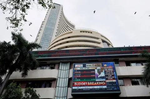 Reuters A screen displays India's Finance Minister Nirmala Sitharaman's budget speech at the Bombay Stock Exchange in Mumbai, India, July 23, 2024. REUTERS/Francis Mascarenhas/File Photo