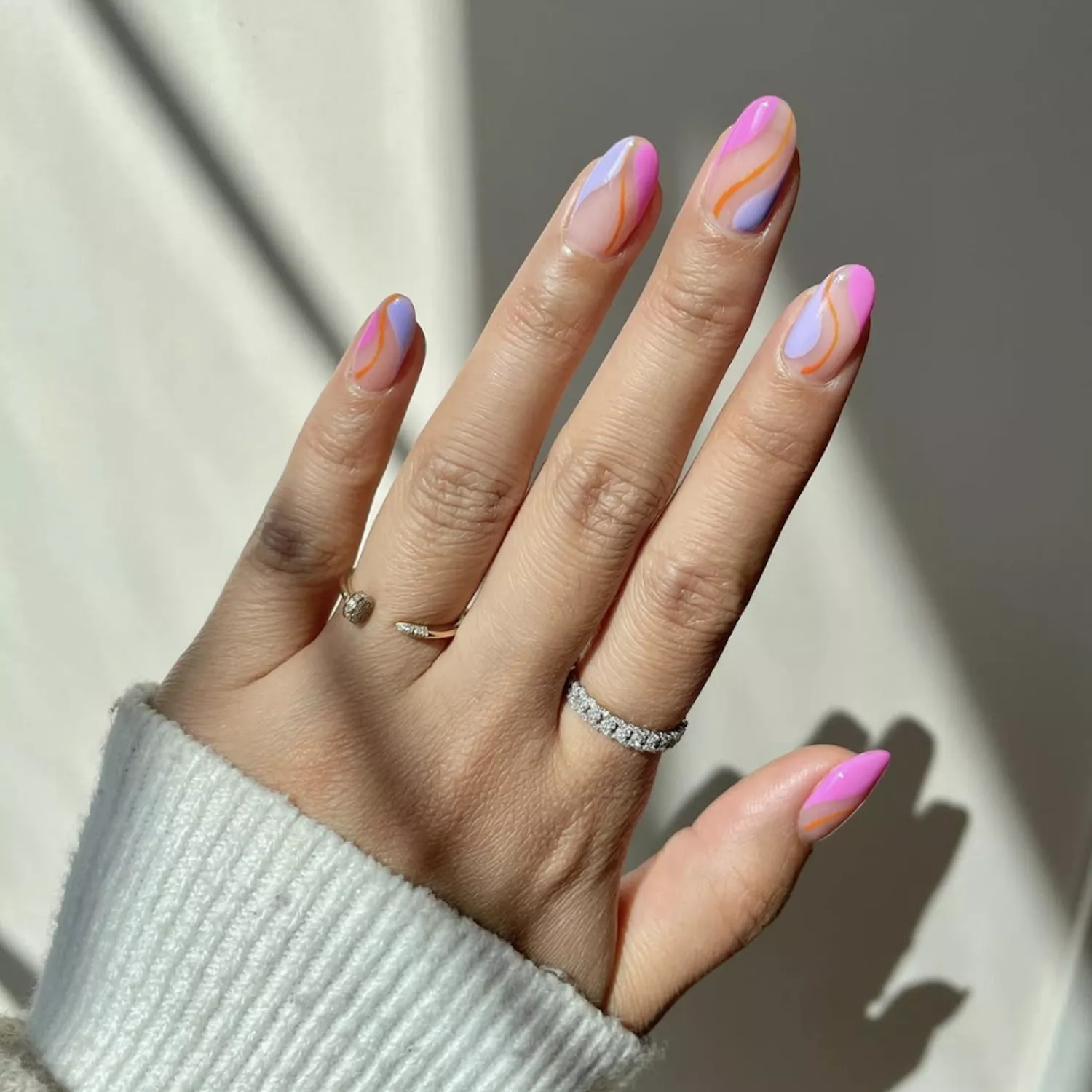 Pink, purple and orange swirl nails