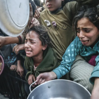 palestinians wait in long queues to receive pots of food photo anadolu agency