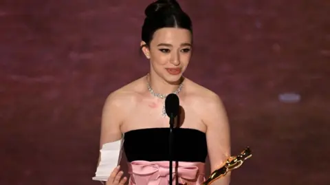 Getty Images US actress Mikey Madison accepts the award for Best Actress in a Leading Role for "Aor" onstage during the 97th Annual Academy Awards at the Dolby Theatre in Hollywood, California on March 2, 2025. (Photo by Patrick T. Fallon / AFP) (Photo by PATRICK T. FALLON/AFP via Getty Images)
