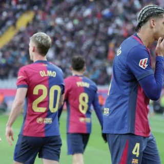 barcelona s uruguayan defender ronald araujo celebrates scoring his team s third goal against real sociedad photo afp