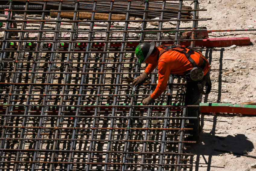 workers install steel rods at a construction site in miami florida u s march 11 2025 photo reuters