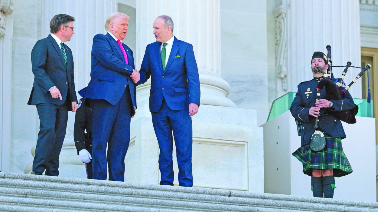 speaker of the house mike johnson r la us president donald trump and irish taoiseach micheal martin leave the us capitol in washington dc photo afp