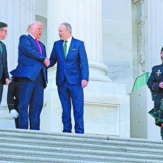 speaker of the house mike johnson r la us president donald trump and irish taoiseach micheal martin leave the us capitol in washington dc photo afp