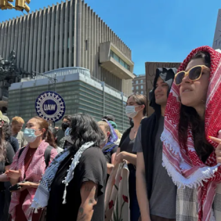 columbia university students and pro palestine protesters march in front of hamilton hall in manhattan new york city on may 1 2024 reuters roselle chen