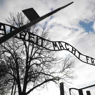 the front gate of auschwitz carries the infamous phrase arbeit macht frei the writer states perhaps we as jews are less alone in our grief than we may fear photo credit kacper pempel reuters