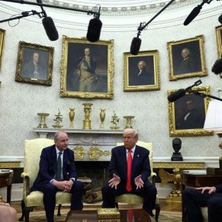 president donald trump reacts during a meeting with irish taoiseach micheal martin with vice president jd vance sitting near them in the oval office at the white house in washington dc on march 12 photo reuters