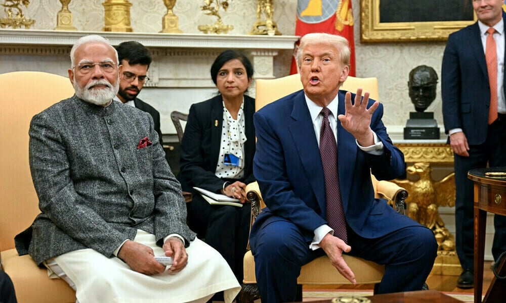 us president donald trump speaks with the press as he meets with indian prime minister narendra modi in the oval office of the white house in washington dc on february 13 2025 photo afp