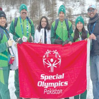 gold medallist of the cross country race muneeb ur rehman who won two events at the special olympics world winter games poses with the head of delegation farkhanda jabeen taha tahir and coaches shumaila erum along with muhammad saleem photo courtesy sop