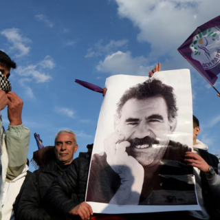 a demonstrator holds a picture of jailed kurdish militant leader abdullah ocalan during a rally in diyarbakir turkey february 27 2025 photo reuters