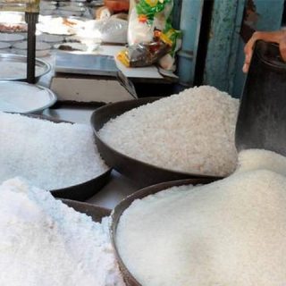 The price per kg of sugar in the open market exceeds Rs 170