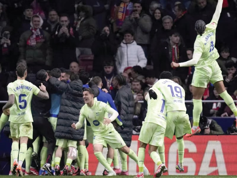 barcelona players celebrate their 4 2 victory photo afp