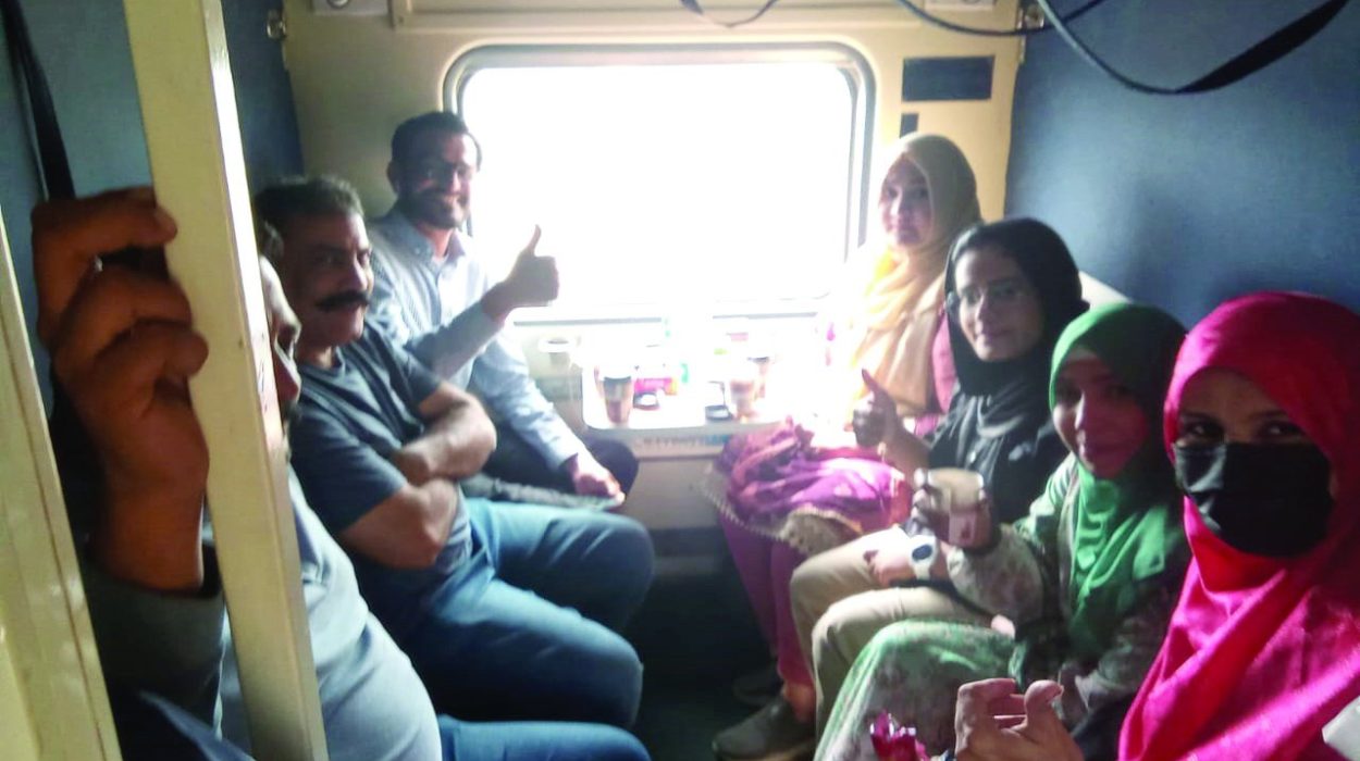 travellers give thumbs up as thar desert safari train chugs off to khokhrapar the last station before the indian border photo express