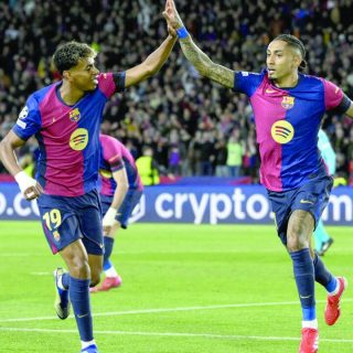 barcelona s brazilian forward raphinha r celebrates with lamine yamal after scoring his team s third goal photo afp